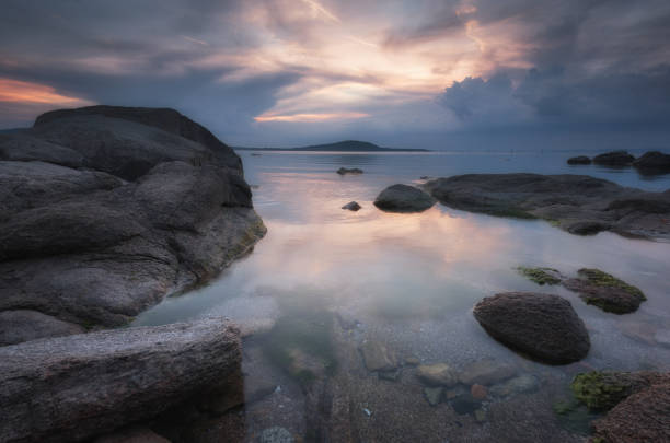 istock Magnificent cloudy sunset over the sea. Spring sunset, landscape, seascape. 693665522
