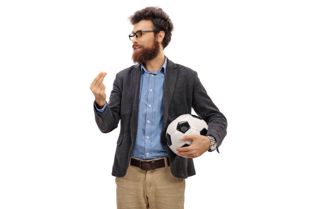 istock Bearded man with a football explaining 693665878