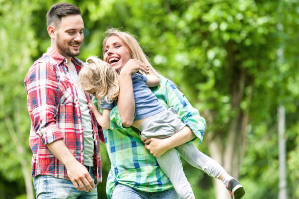 istock Happy Family in the Park 693673468