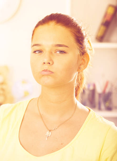 istock bored girl portrait 693677990