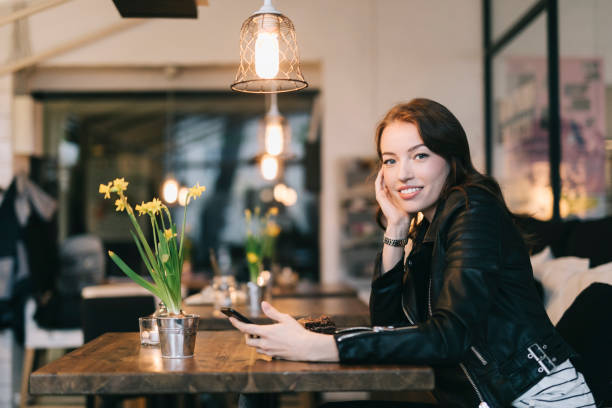 istock Woman in a cafe 693682464