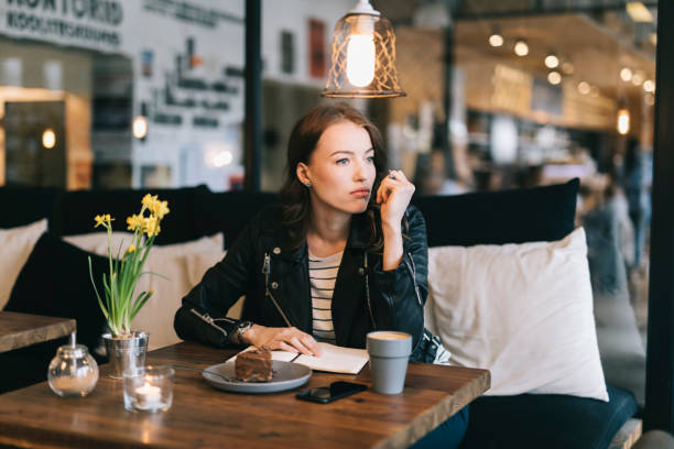 istock Young woman contemplating 693682478