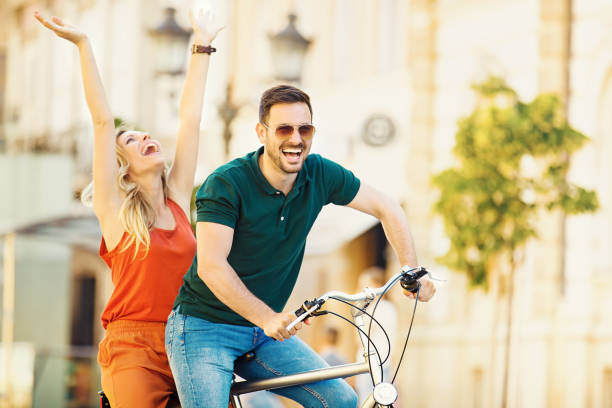 istock Love Couple Riding Bicycle 693682588