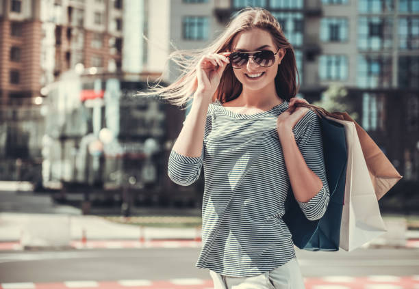 istock Girl doing shopping in city 693683736