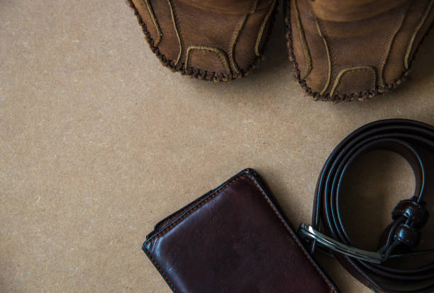 istock Men fashion on wood texture. 693694726