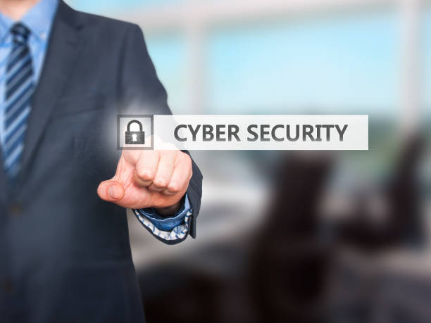 istock Businessman pressing Cyber Security button on virtual screens 693696926