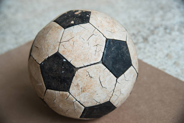 istock Old football on the fall 693697168
