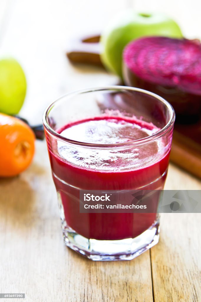 Fresh Beetroot, Carrot and Apple juice by fresh ingredient Apple - Fruit Stock Photo