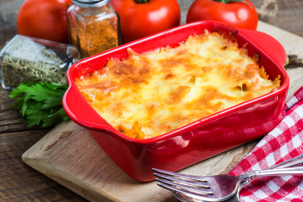 istock Bacon lovers' mac and cheese in baking dish Cheese face 693698278