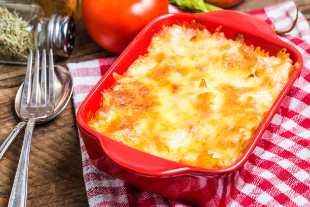 istock Bacon lovers' mac and cheese in baking dish Cheese face 693698834