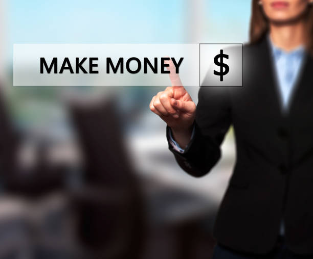 istock Businesswoman pressing make money button on virtual screens 693699530