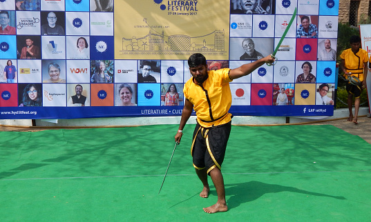 Hyderabad,India-January 28:Indian tamil artists demonstrate silambam,ancient martial art form, in Hyderabad literary festival on January 28,2017 in Hyderabad,India