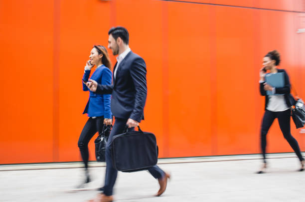 istock Business People Walking Outside Building, Blurred motion 693737138