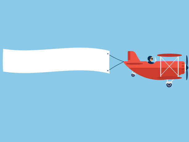 Airplane with poster Airplane with blank poster. Plane with banner. Red Biplane with white ribbon in blue sky. Vector propeller airplane stock illustrations