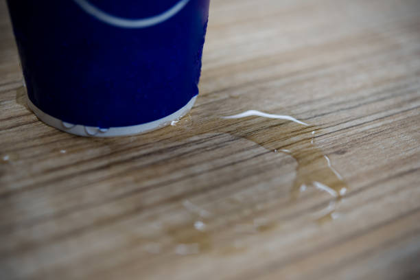istock Water droplets on table and glass,Selective focu 693740454