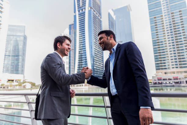 istock Businessmen shaking hands in ageeement. 693743936