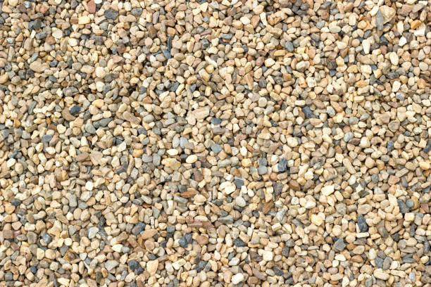 istock Small beautiful colorful pebbles, Multicolored little rocky background. 693745054