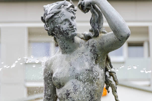 istock statue of a water nymph 693756250