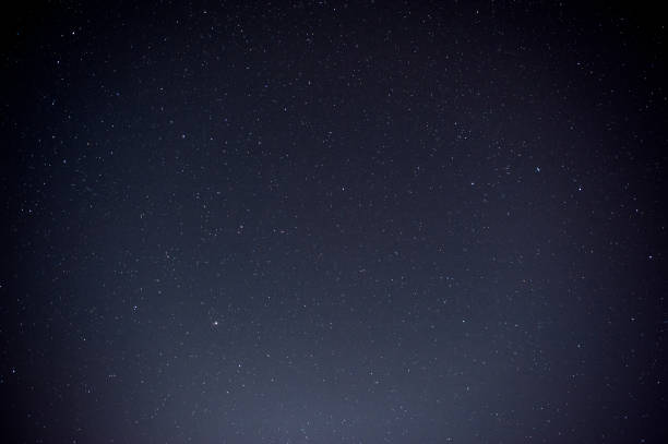 istock Black night sky plenty of stars with 693756932