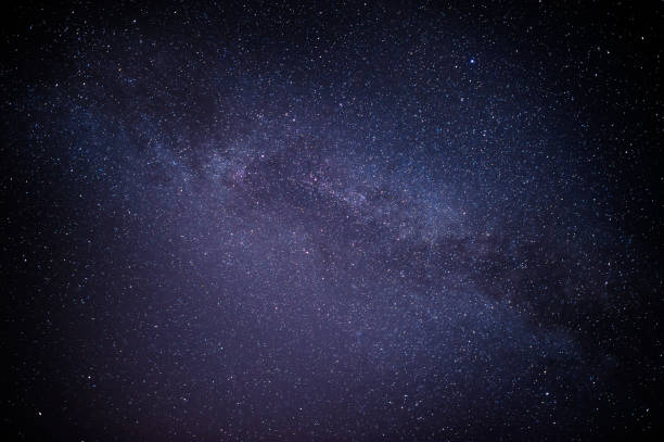 istock Black night sky plenty of stars with 693757768