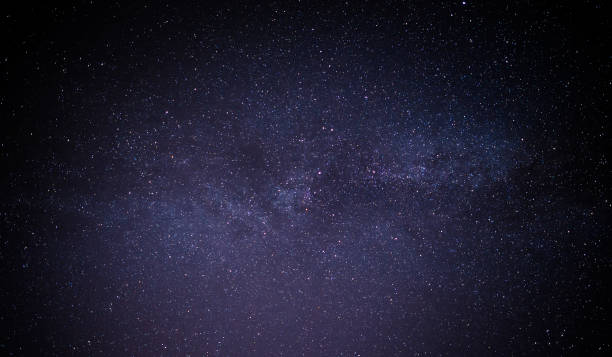 istock Black night sky plenty of stars with 693757888
