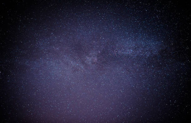 istock Black night sky plenty of stars with 693757972