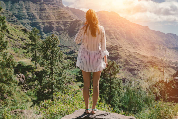 istock Young woman on holidays 693757988