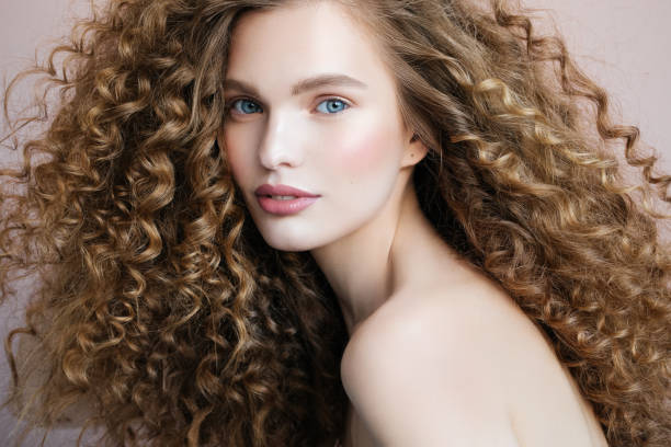 Beautiful model Beautiful model curly hair stock pictures, royalty-free photos & images