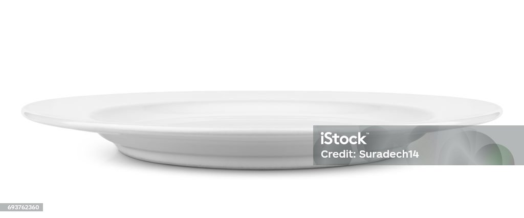 Simple white circular plate Empty ceramic round plate isolated on white with clipping path Front View Stock Photo