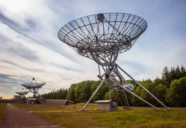 An row of radio telescopes in westerbork in the Netherlands