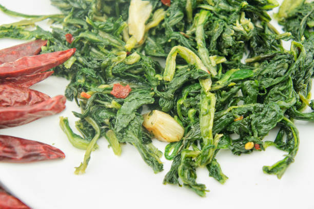istock Sauteed chicory with garlic and chili pepper 693768548