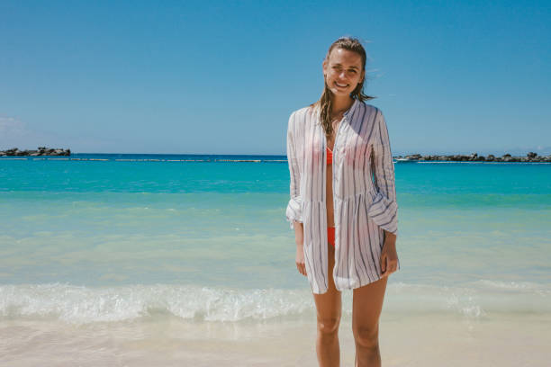 istock Young woman on the beach 693770994