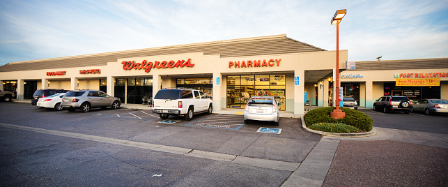 Walgreens pharmacy drug store entrance facade with sign panorama, photographed in San Jose, California on boxing day.