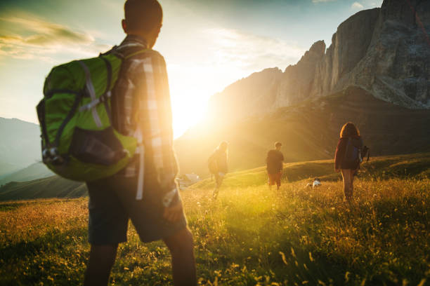 istock Adventures on the Dolomites: friends hiking up mountain 693777496