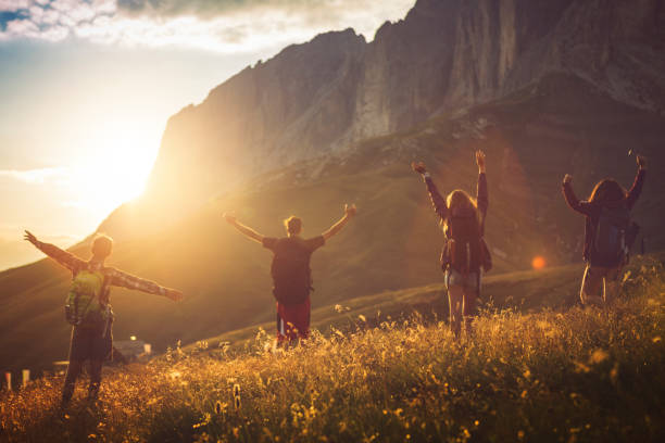 istock Adventures on the Dolomites: friends hiking up mountain 693777588