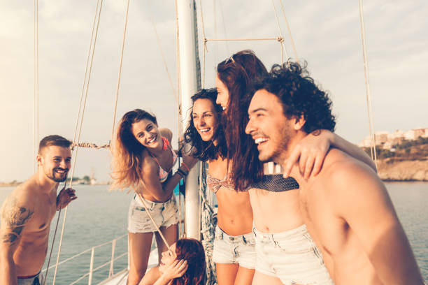 istock Group of friends on a yacht 693791196