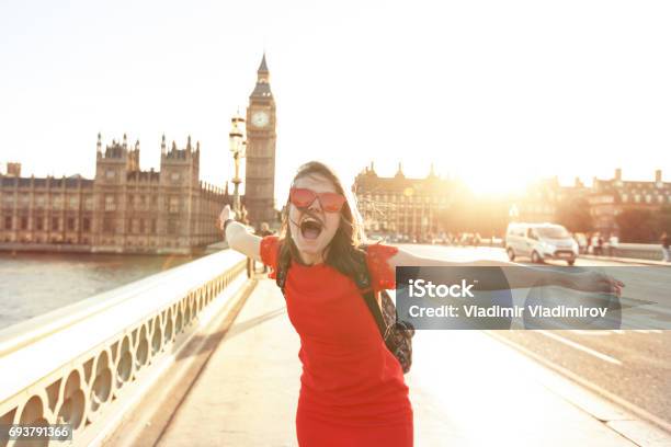 Woman Having Fun At Sunset Stock Photo - Download Image Now - London - England, Tourist, Travel