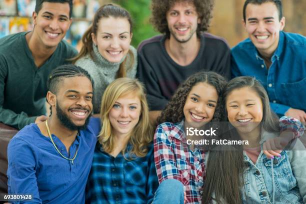 University Friends Hang Out In The Dorm Stock Photo - Download Image Now - Multiracial Group, University Student, 20-29 Years