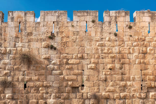 Old Jerusalem City Wall Old stone wall in Jerusalem Old City, Israel fortified wall stock pictures, royalty-free photos & images
