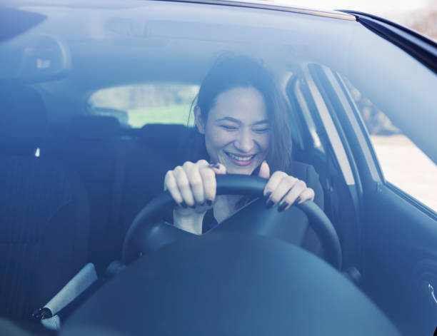 istock Woman driving a car 693810492
