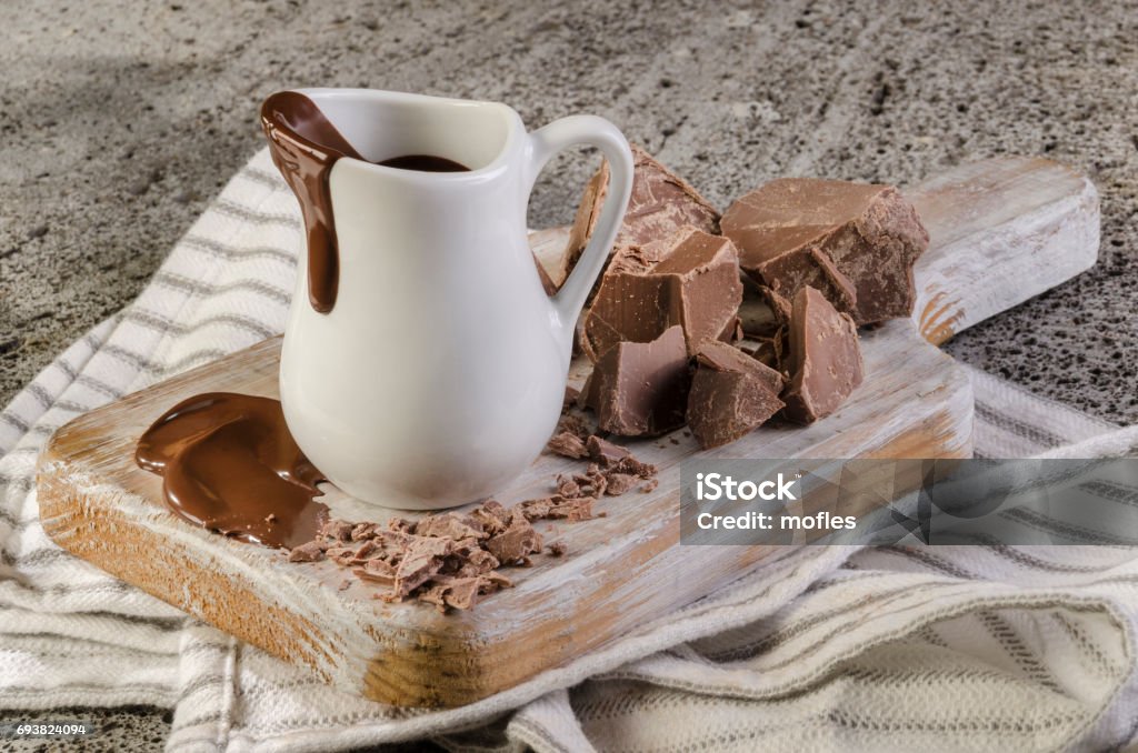 Molten chocolate Ready melted chocolate to cover any dessert Block Shape Stock Photo