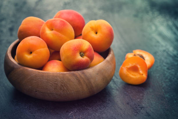 Fresh sweet ripe organic apricots in a bowl
