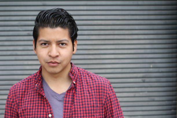 istock Good looking Hispanic male isolated with copyspace 693826612