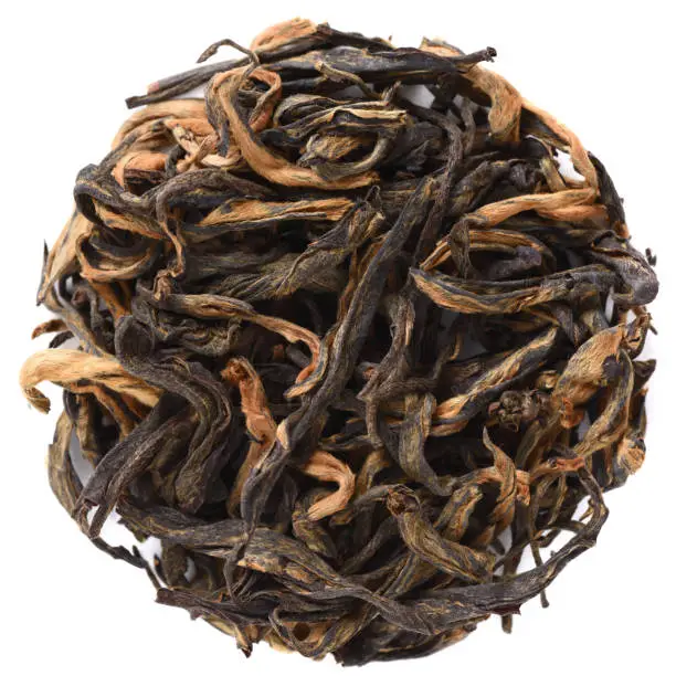 Assamica Big Tree Black Tea isolated in round shape