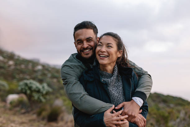 istock Romantic young couple on country trail 693829474