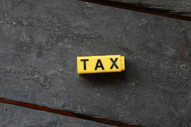 istock Word tax on a wooden table 693838174