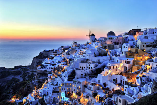 istock Oia Village at Sunset on Santorini Island Greece 693841064