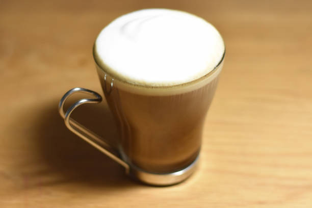 istock My afternoon latte in an Italian glass cup. 693841376