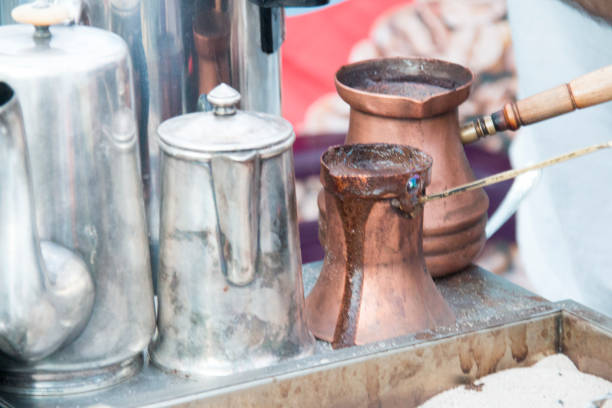 istock coffee preparation in copper pot with hot sand 693841818