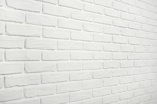 white brick wall, angle view, abstract background photo